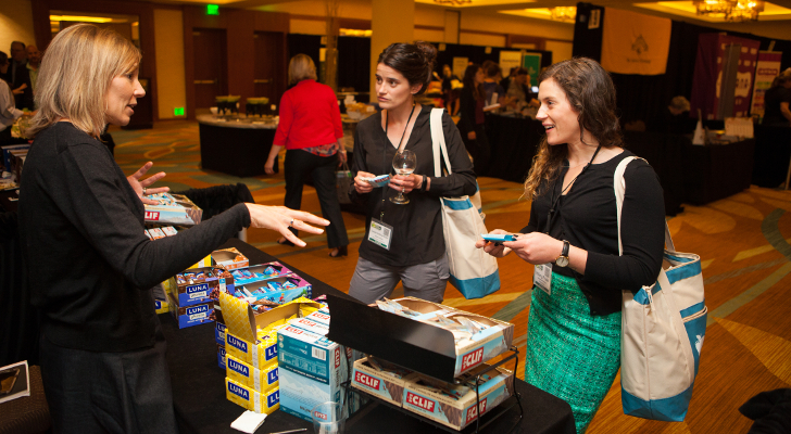 Laura Holtrop Kohl of Harmons Grocery (center) and Hannaford’s Hillary Pride meet with Clif Bar’s Tara Delloiacono