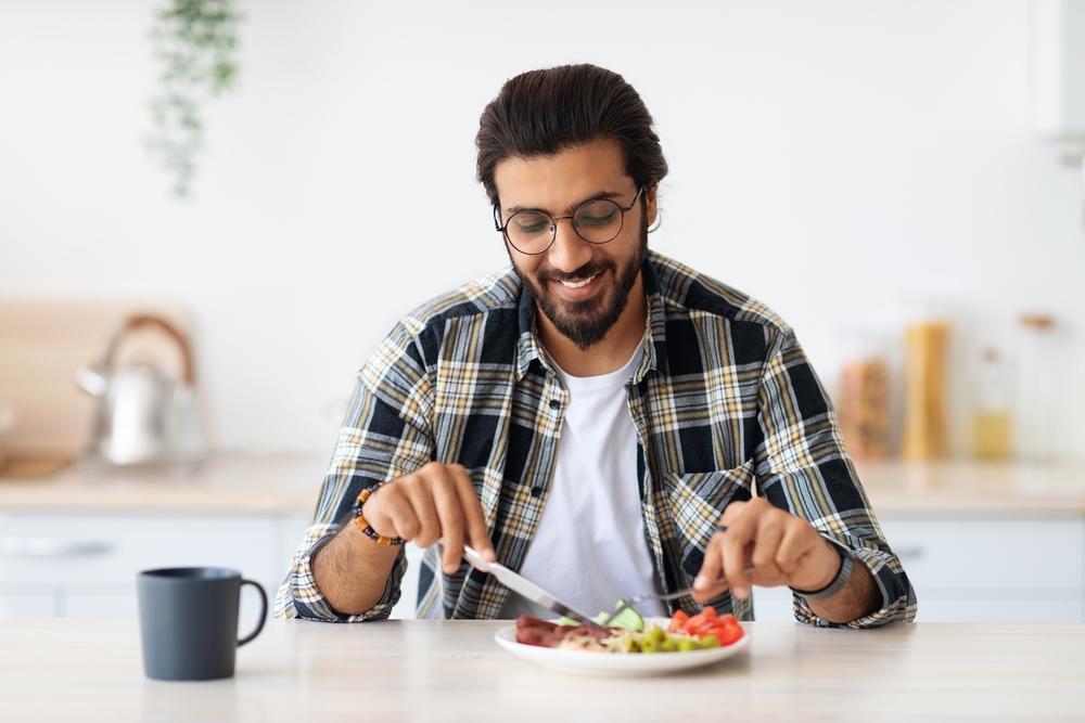 Guy Eating Healthy Meal Main Image