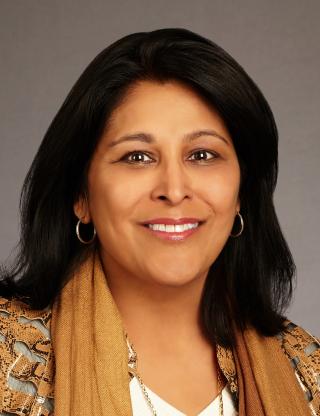 a woman smiling for the camera