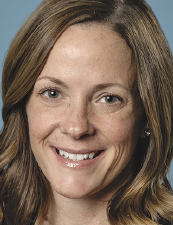 a woman smiling for the camera