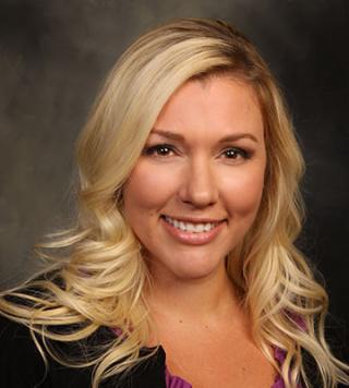 a woman smiling for the camera
