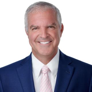 a man wearing a suit and tie
