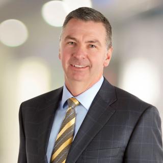 a man wearing a suit and tie