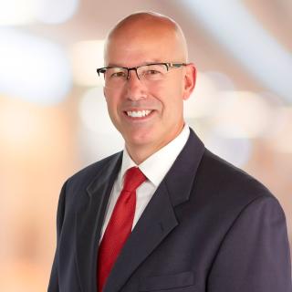 a man wearing a suit and tie