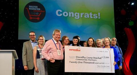 Dorothy Lane Market team accepts an award from Supervalu