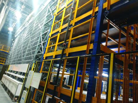 This racking system at Walmart’s flagship store in Rogers, Ark., is designed to increase capacity and expedite the process for the retailer’s grocery pickup service. Company-wide, Walmart has hired and trained 45,000 pickers for its online grocery business.