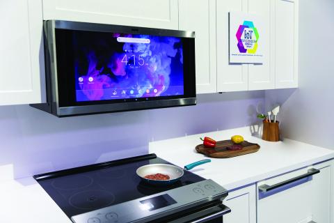 GE's microwave hood that installs over a stove is integrated with the Google Assistant and comes with a 27-inch high-definition display and Bluetooth-enabled speakers.