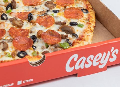a pizza sitting on top of a box
