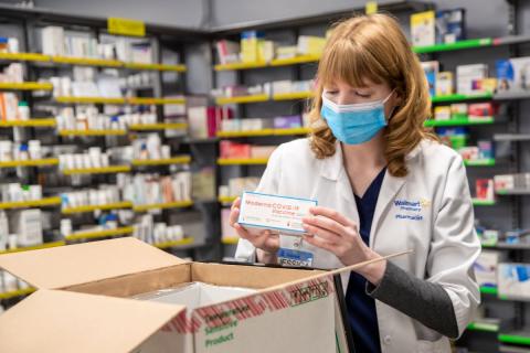 a person standing in front of a store