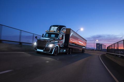 a truck that is driving down the highway
