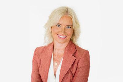 Carolyn Everson posing for the camera