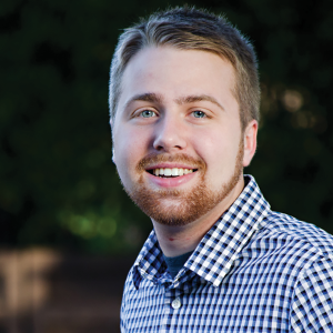 a man smiling for the camera