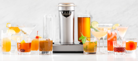 a glass of orange juice next to a cup of coffee