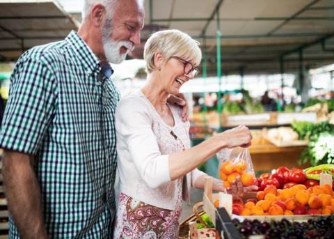 Older Couple Buying Fresh Food Main Image