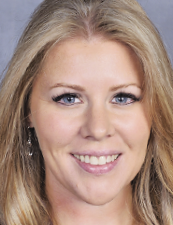 a woman smiling for the camera