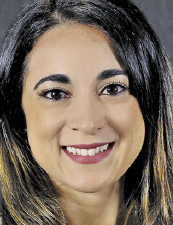 a woman smiling for the camera