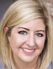 a woman smiling for the camera