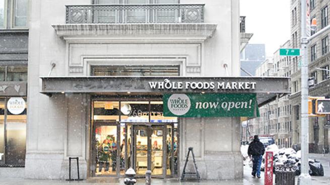 A Whole Foods Market delivery van in the Chelsea neighborhood of New York  on Monday, July