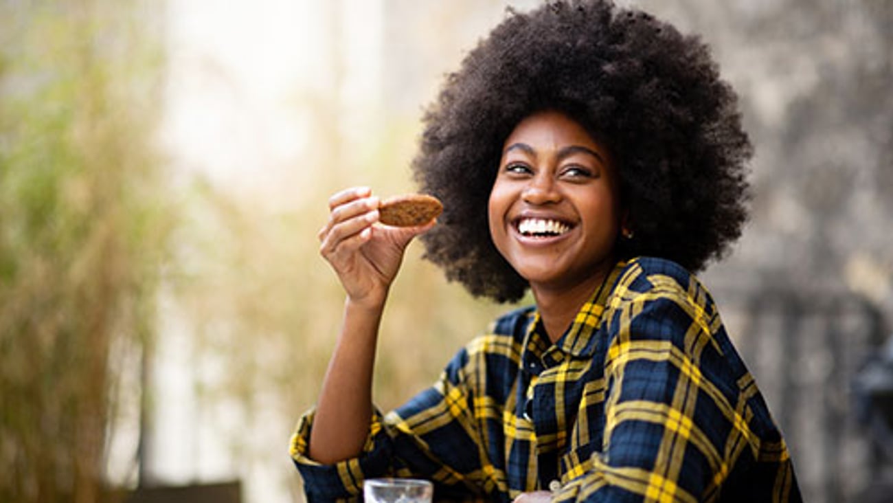 Woman Enjoying a Cookie Teaser
