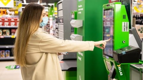 a person standing in front of a store