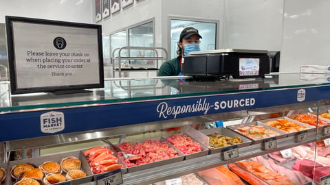 a display in a store filled with lots of food