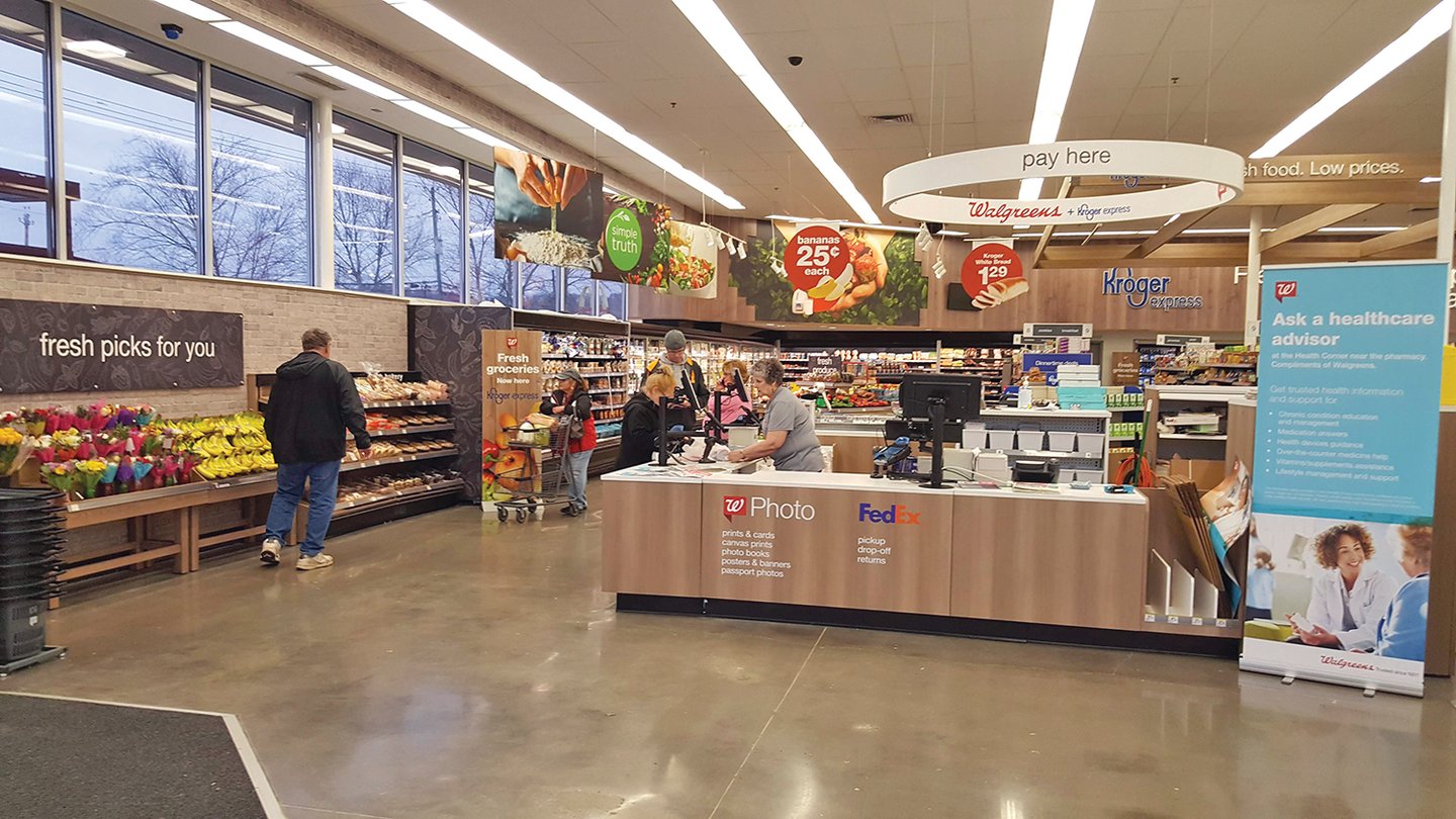 A front end at a Walgreens store in Fountain City, Tennessee, features a reconfigured central checkout area.