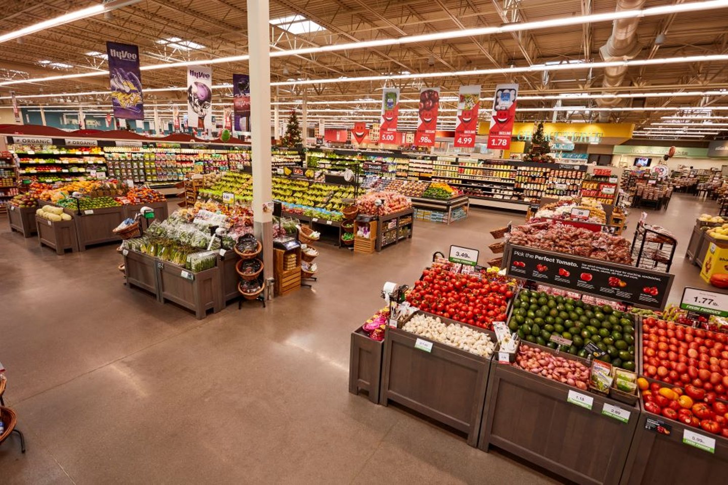 a variety of fruits and vegetables on display in a store