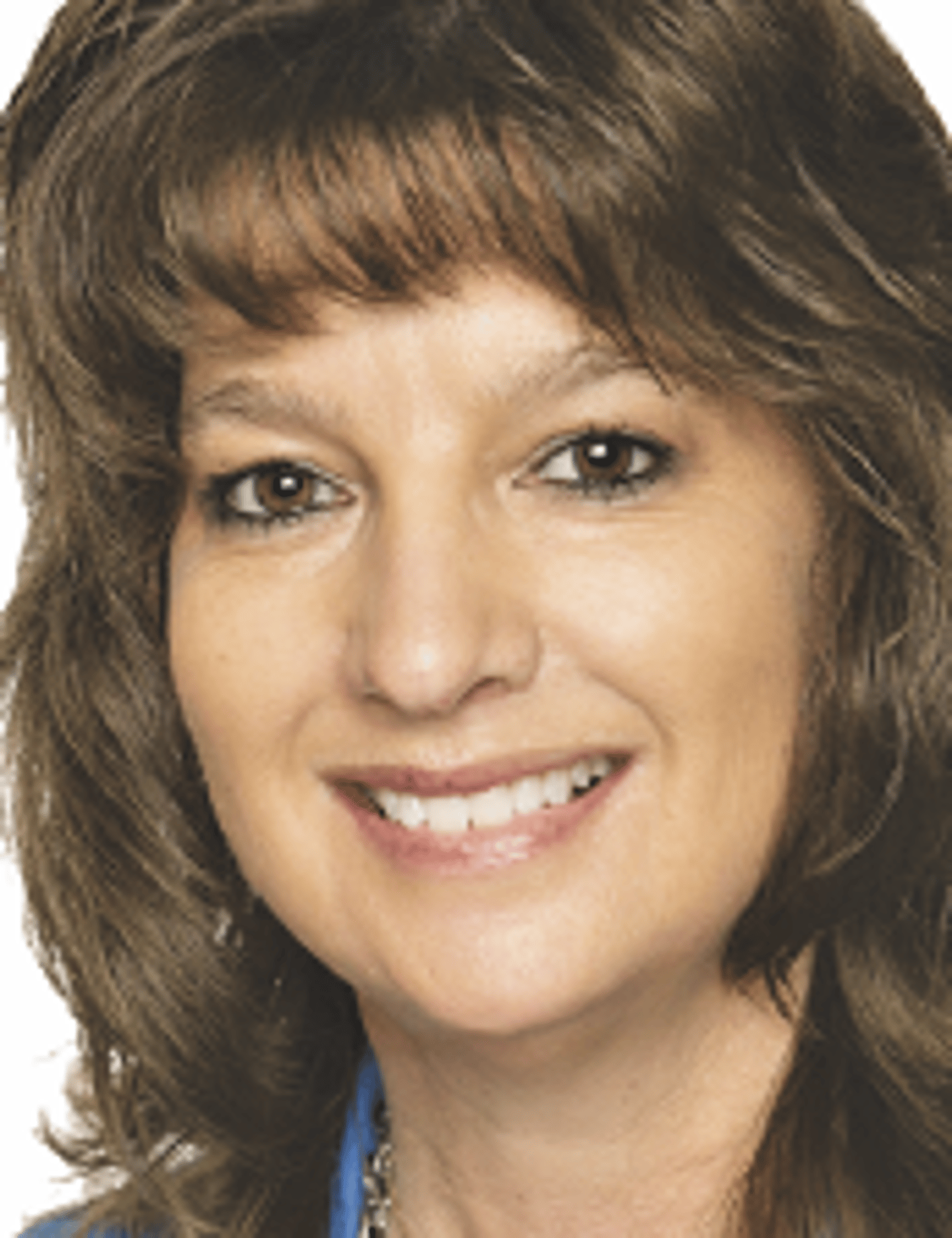 a close up of a woman who is smiling at the camera