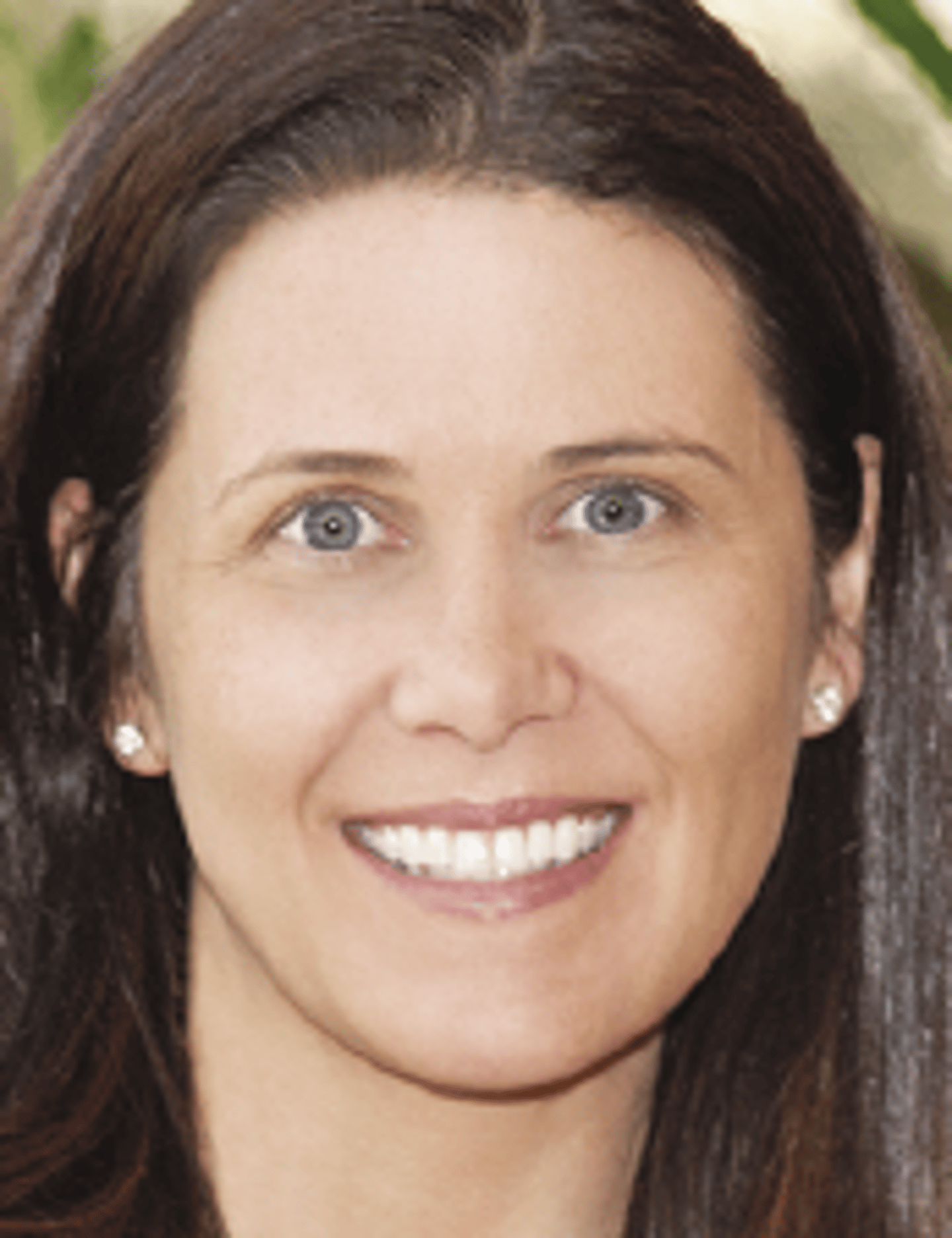 a woman smiling for the camera