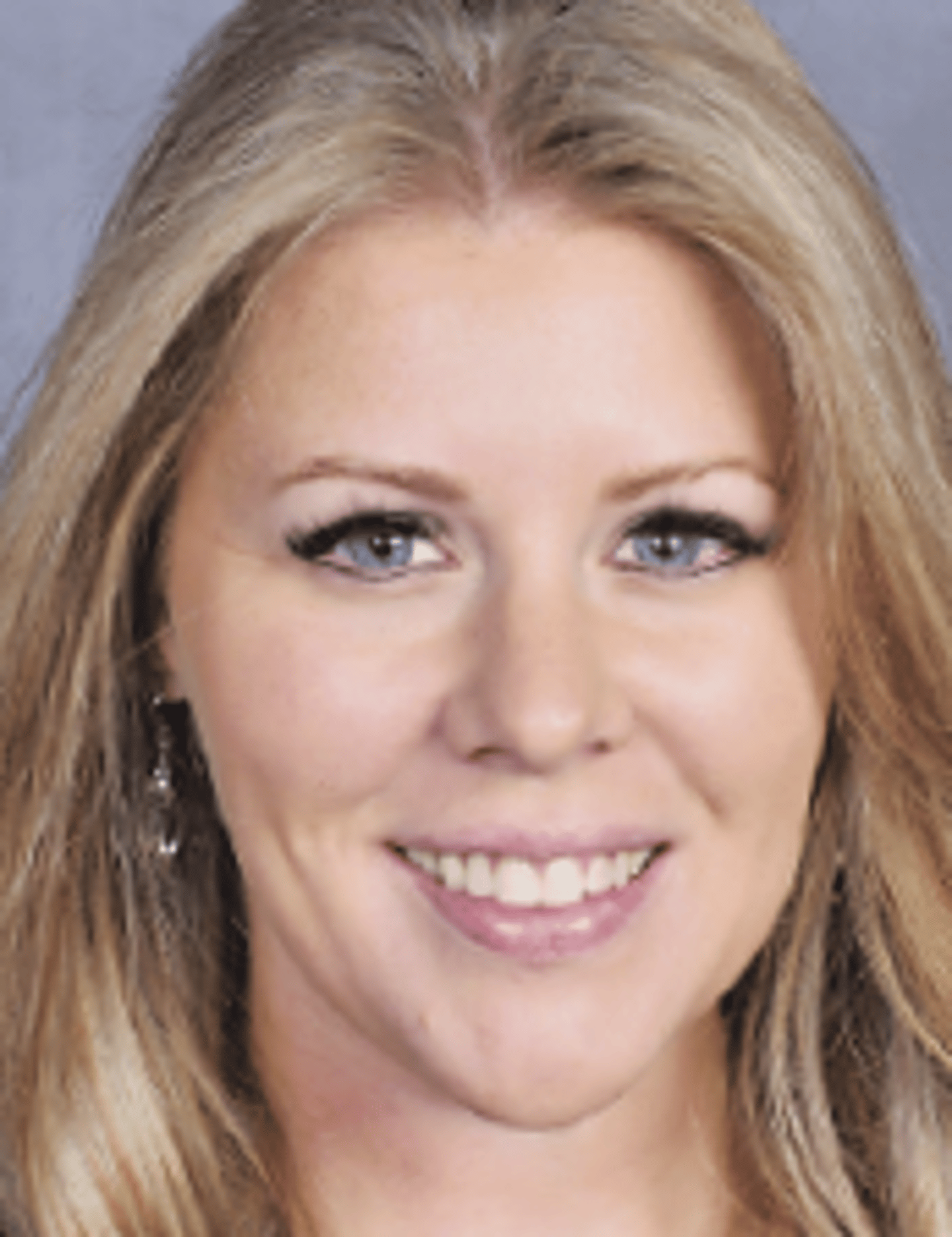 a woman smiling for the camera