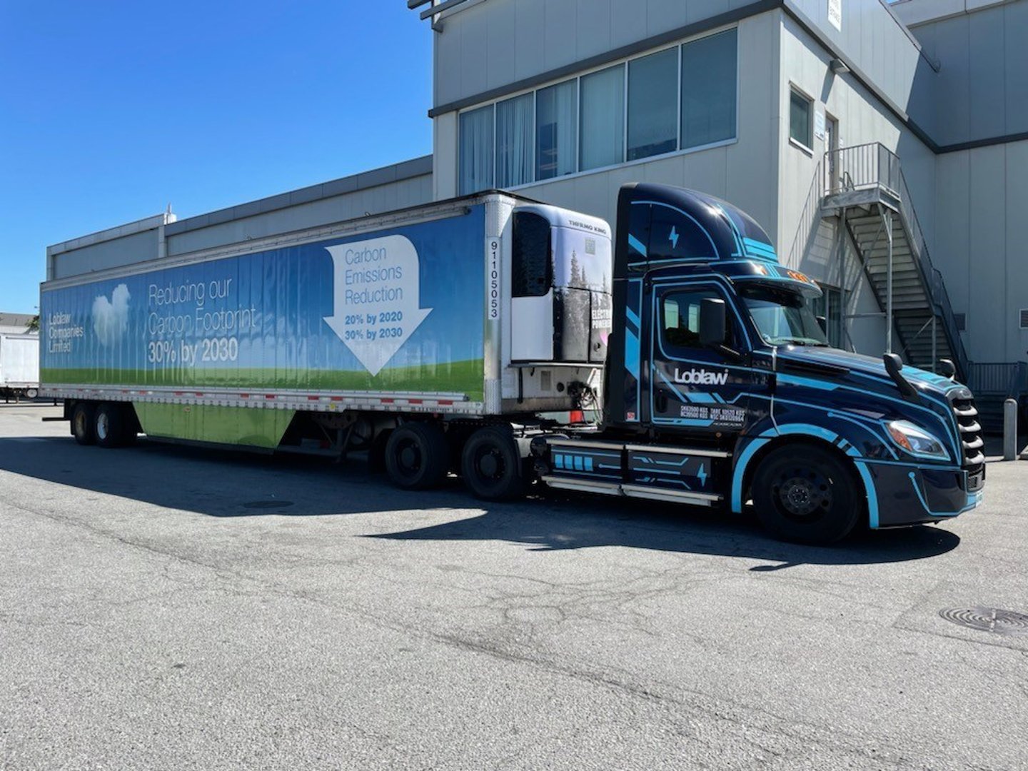 a truck is parked on the side of a building