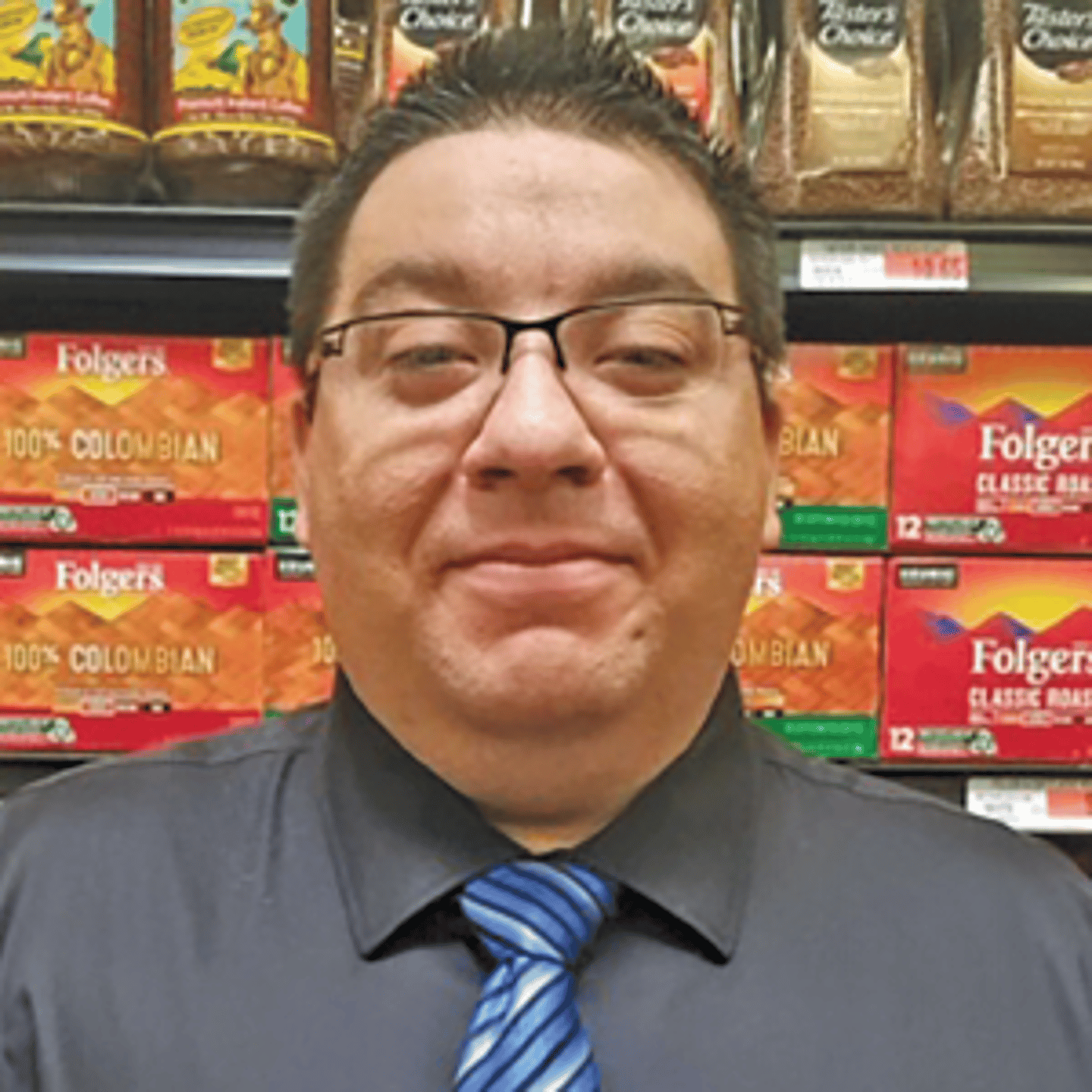 a man standing in front of a store