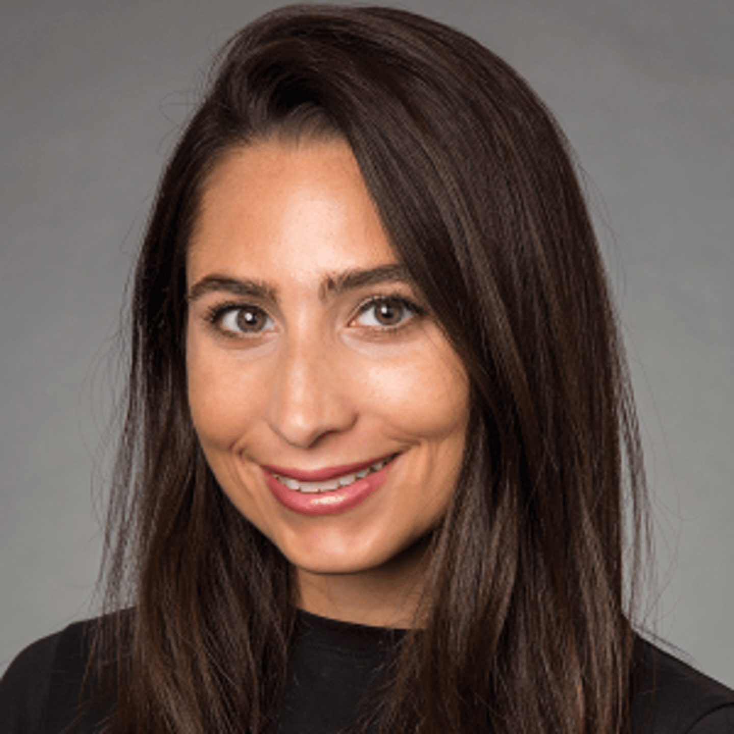 a woman smiling for the camera
