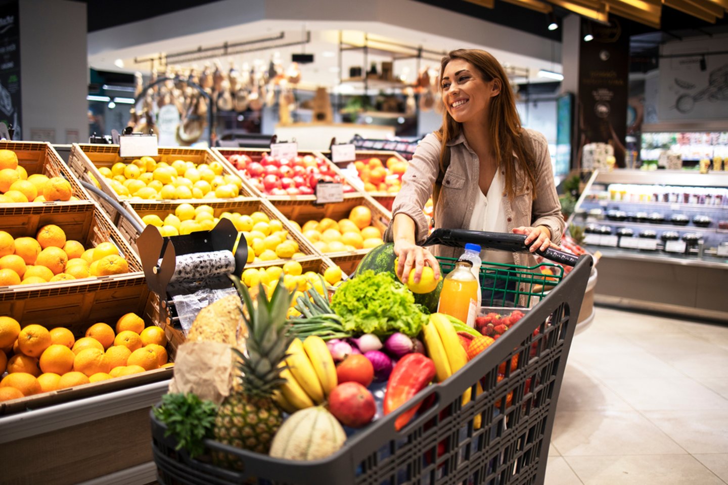 Shopping for Produce in Supermarket Main Image