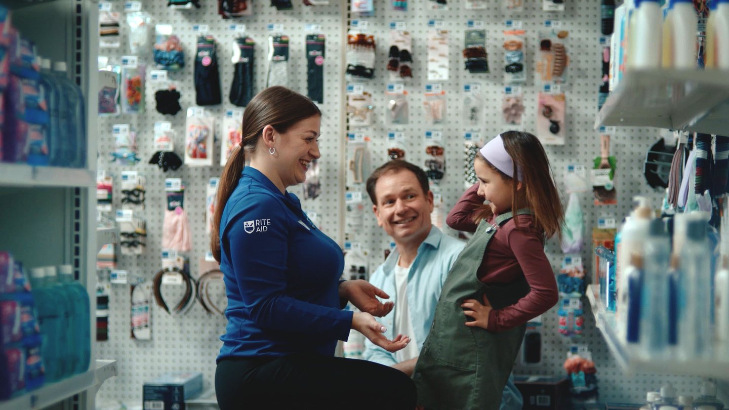 Rite Aid Manager With Girl Main Image