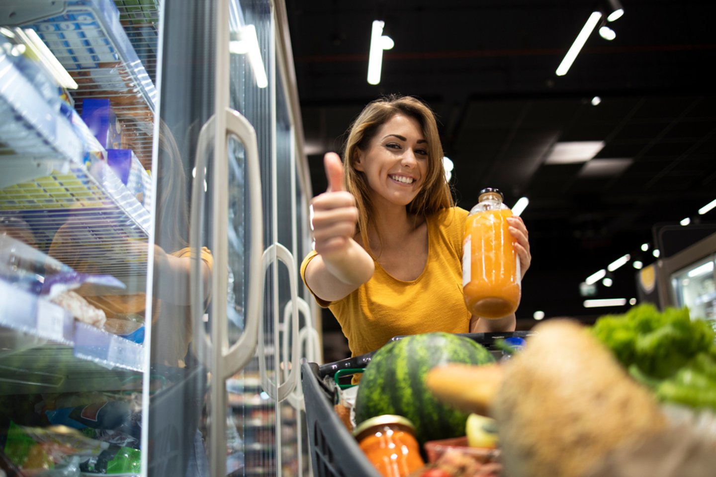 Woman Buying Groceries Main Image