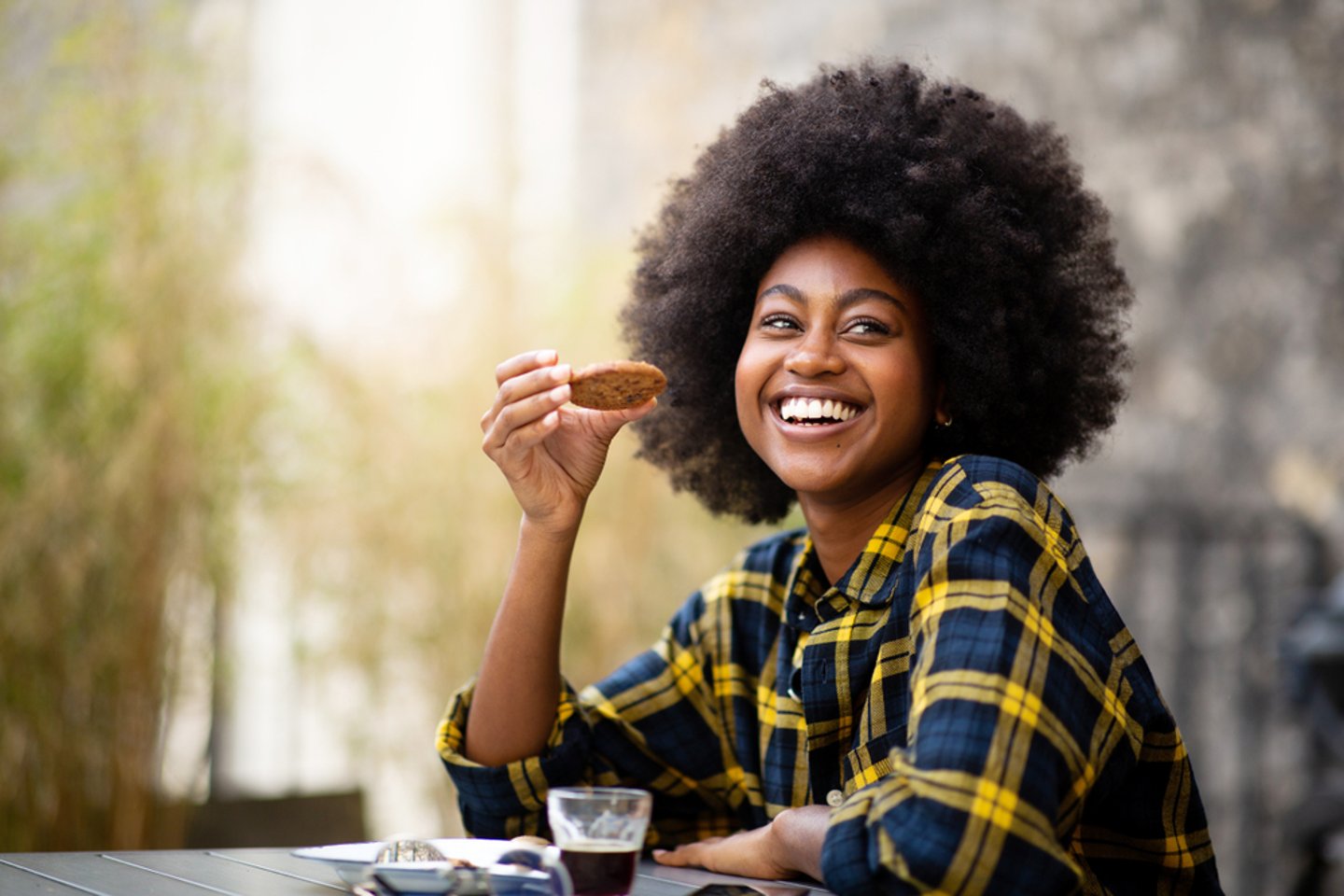 Woman Enjoying a Cookie Main Image