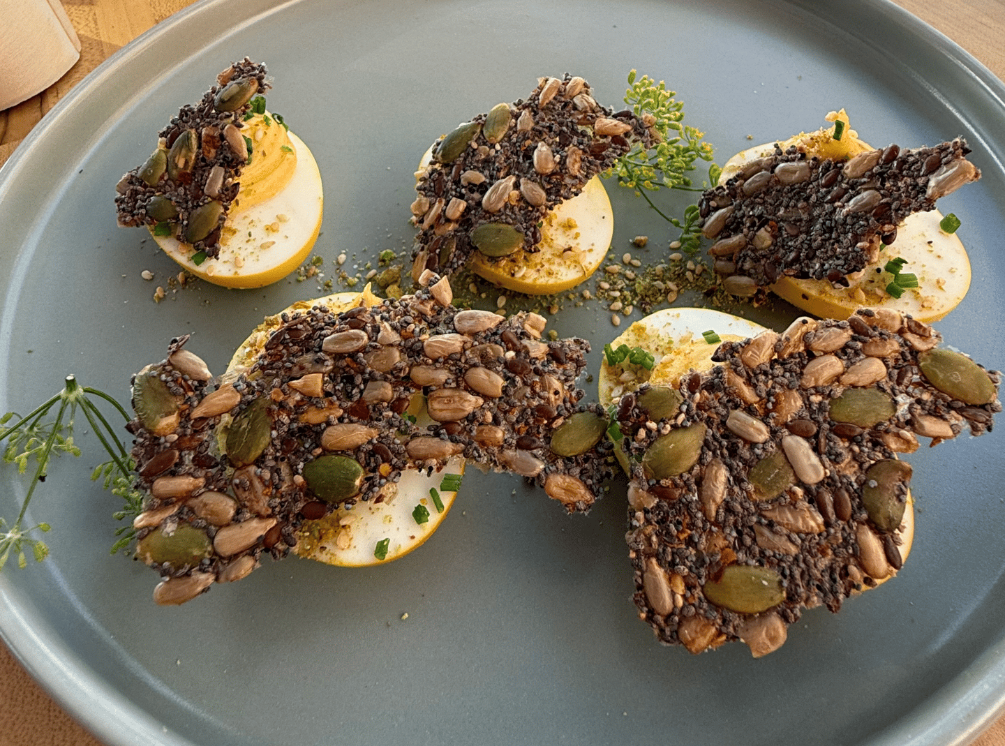 Whole Foods Market culinarians created a recipe to illustrate the "protein power up" trend: turmeric deviled eggs with dukkah, seedy cracker and fresh herbs.