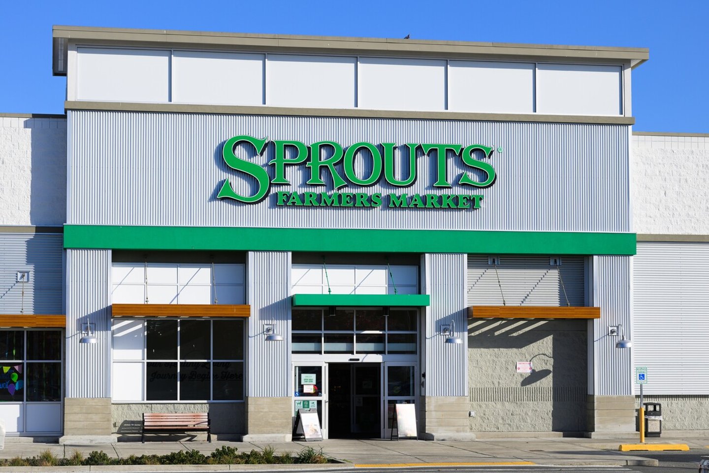 Seattle - November 8, 2023; Facade of Sprouts Farmers Market grocery store with signage in brand color; Shutterstock ID 2387520863